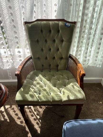 Mid-century traditional arm chair w/ tufted velvet upholstery, cane side panels