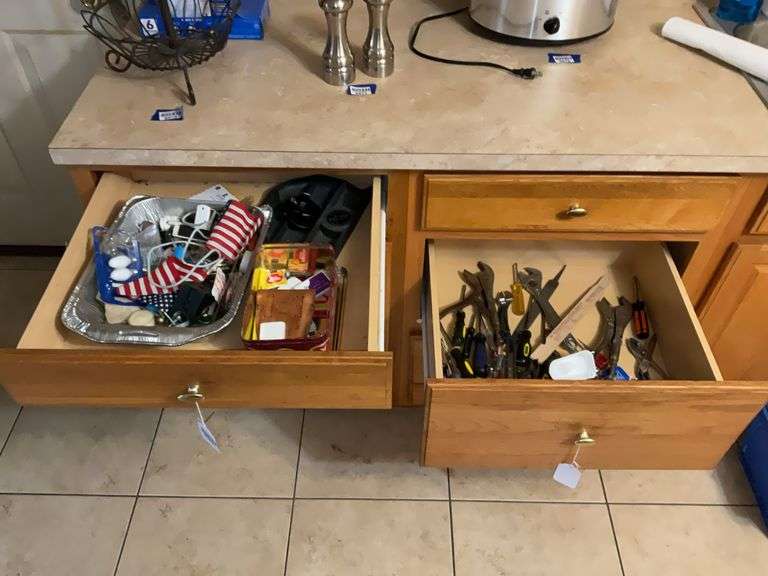 Contents of two drawers: hand tools, household items