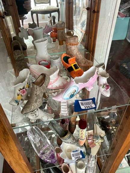 Contents of shelf: shoes in porcelain, ceramic, misc, including pink luster w/ Napoleon portrait