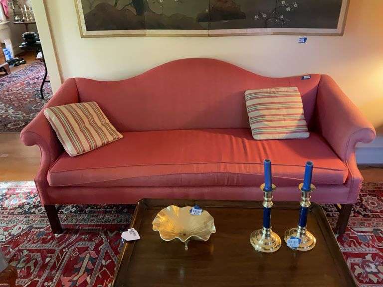 Camel back sofa w/ scrolled arms, square legs, rose upholstery, w/ two striped throw pillows 78x34