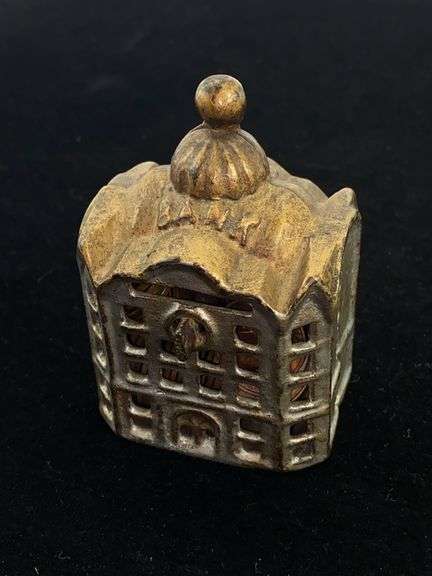 Cast iron Bank Building still bank w/ penny contents