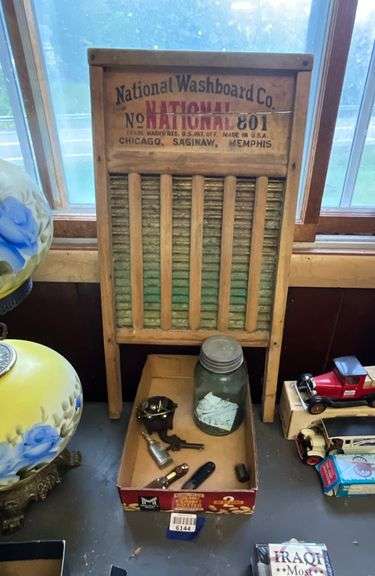 Wooden washboard, iron cap pistol, pocket knife, blue canning jar, mini kettle, misc