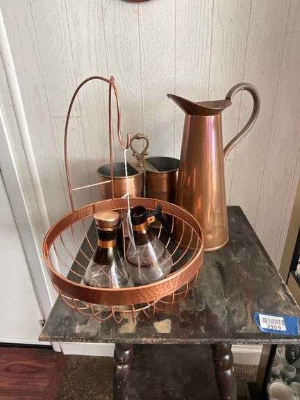 Copperware including: ewer, fruit basket