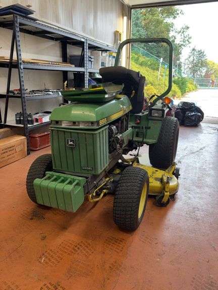 John Deere 855 lawn tractor, 1369 hours, with mower deck and front weights. *** see Lot 8415 for a JD Cab Enclosure!