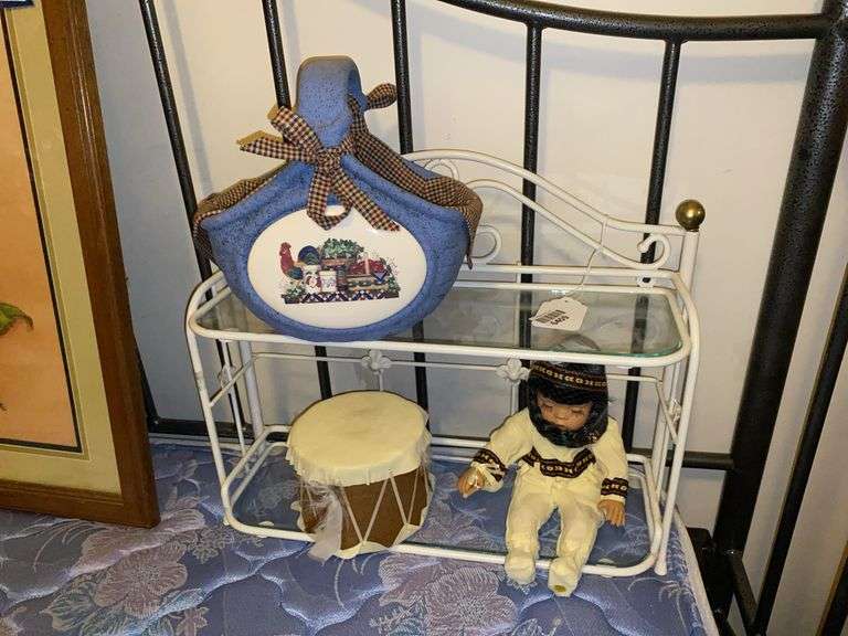 Metal what-not shelf, pottery basket, Native American doll w/ drum