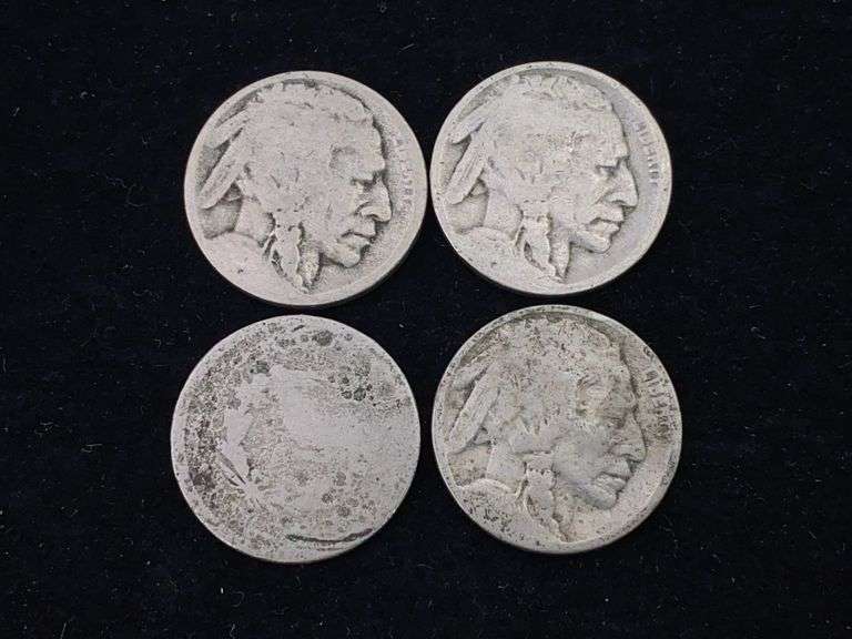 Four nickels: one Liberty Head nickel and three Buffalo nickels