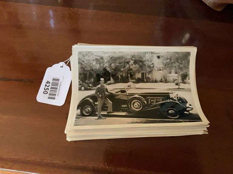 Black & white photographs of antique autos