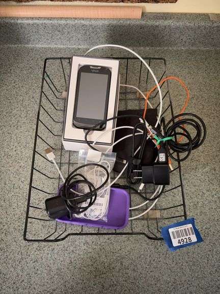 T-Mobil My Touch smart phone, phone cover, electric cables, wire basket