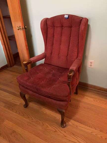 Wing chair w/ open arms, tufted upholstery