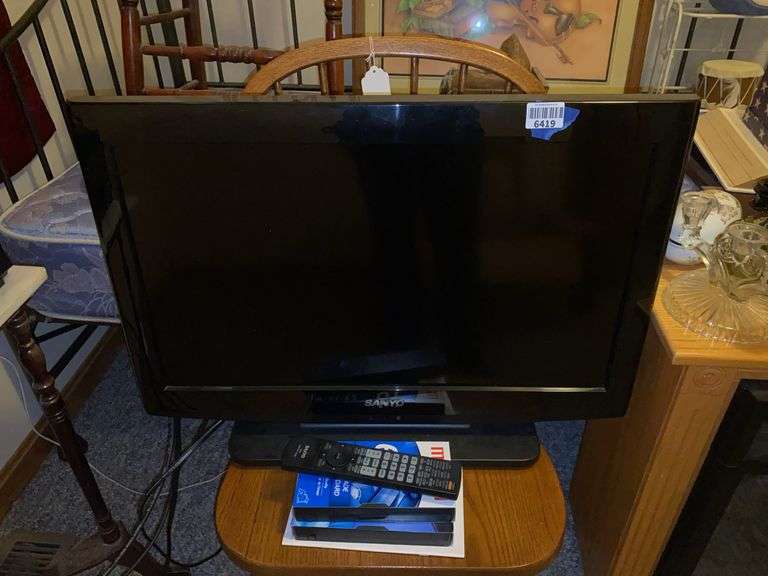 Sanyo TV model: DP26640 w/ remote, and VHS tapes