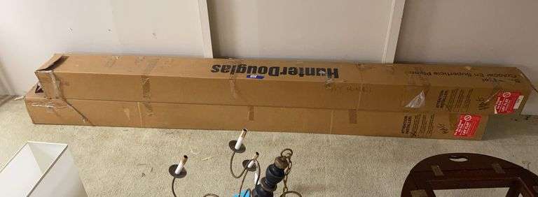 Two Hunter Douglas window shades, in boxes