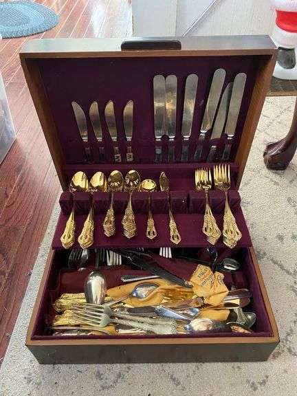Gold tone and assorted flatware in case