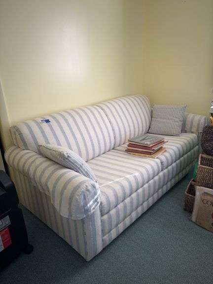 Blue & white striped sofa w/ two throw pillows 74x35