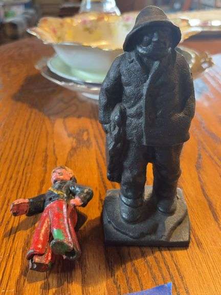 Cast iron sea captain figure, and toy figure