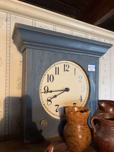 Country wooden clock in blue paint