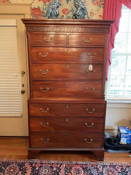 Chippendale chest on chest w/ dentil molded and carved frieze, inset reeded corner columns to top, bracket feet 42 x 21 x 74