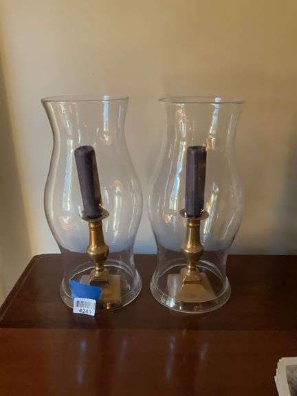 Pair of brass candlesticks w/ glass hurricane globes