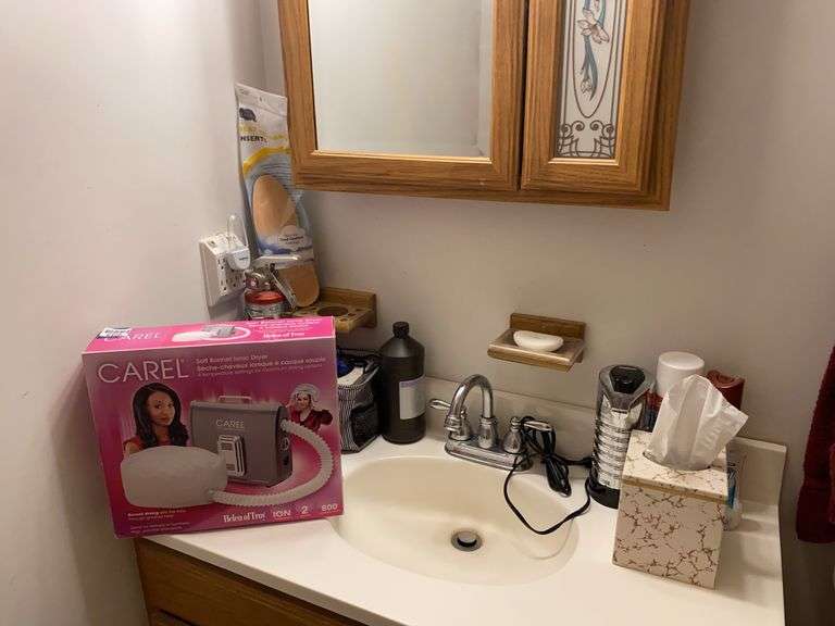 Contents of vanity top: bonnet hair dryer, fire extinguisher, misc