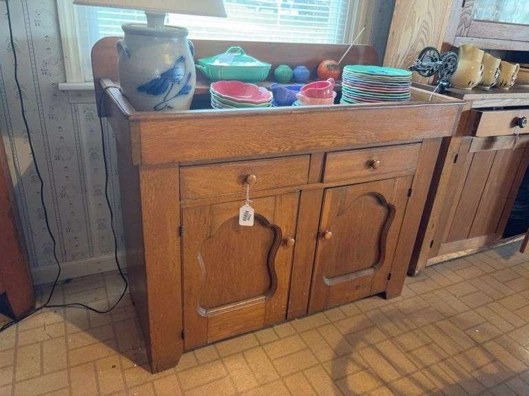 Oak drysink w/ backsplash, two drawers over shaped panel doors - no contents 44x21x39 - MUST COME DURING LAST 2 HOURS OF PICKUP FOR THIS ITEM