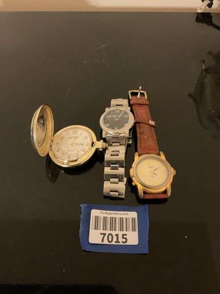 August Steiner JFK half dollar coin quartz pocket watch, and two wrist watches