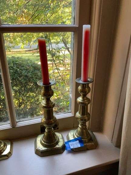 Pair of brass candlesticks, w/ candles
