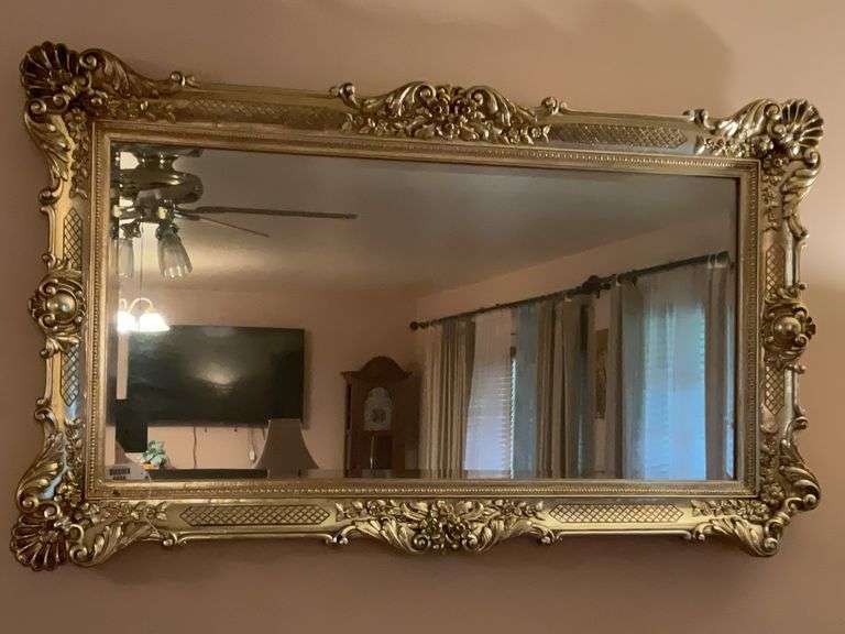Beveled mirror in gilt frame 31 x 58