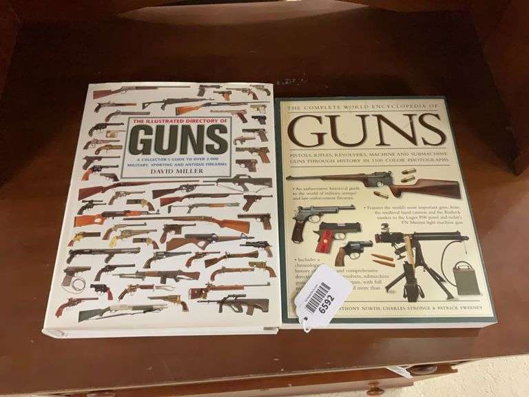 Two books: The Illustrated Directory of Guns, The Complete World Encyclopedia of Guns