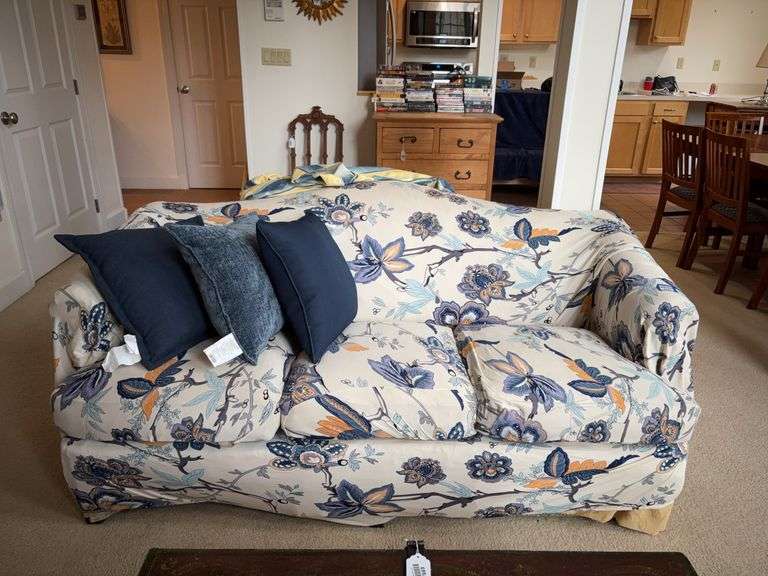 Sofa w/ blue & white floral slipcovers and coordinating throw pillows 75x34