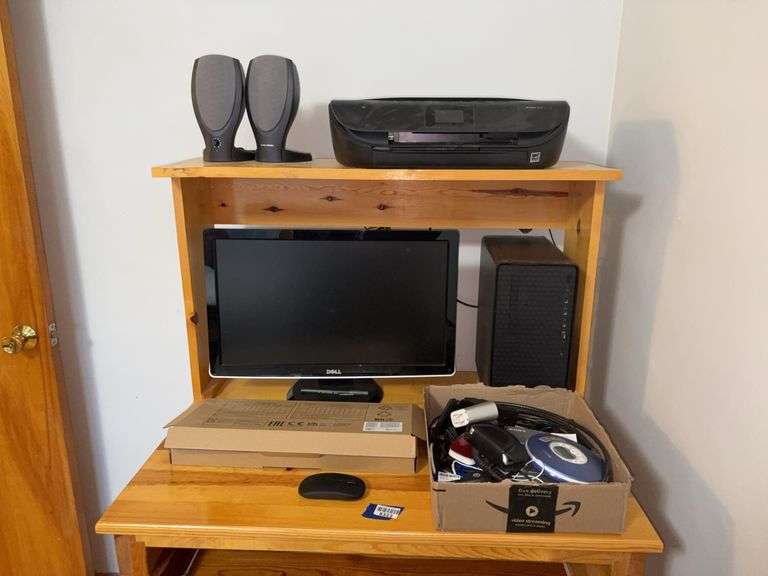 Contents of desk: Dell desktop computer equipment, HP Envy 5070 printer, speakers, cables, misc