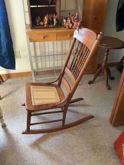 Press carved oak sewing rocker w/ caned seat