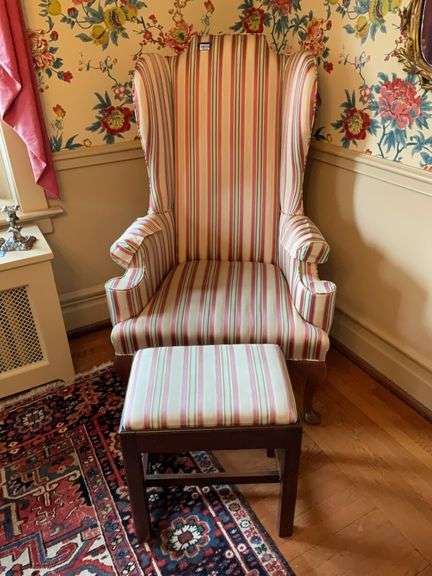 Wing arm chair in striped upholstery along w/ foot stool in matching upholstery
