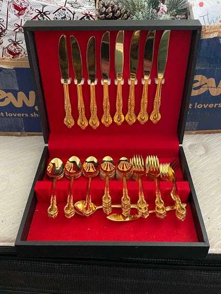Gold tone flatware set in case, no markings