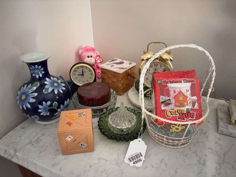 Dresser clocks, porcelain vase, wire basket, glass ashtrays, Beanie Baby monkey, misc