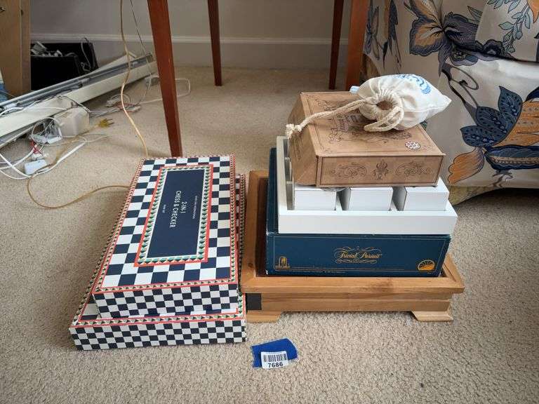 Game sets including: backgammon, chess/checkers, tic-tac-toe, Trivial Pursuit