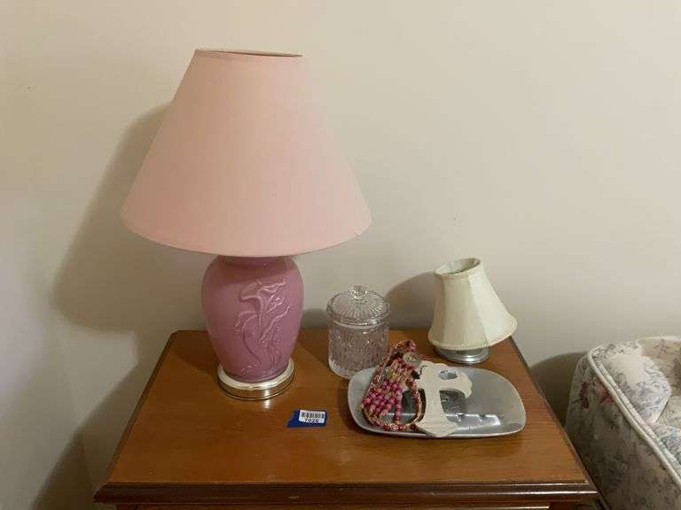 Pink table lamp w/ matching shade, small lamp, covered glass jar, ashtray, necklace, cross ornament