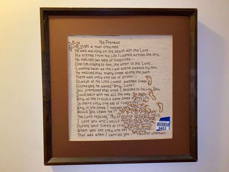 Wall hangings: needlework quotation, bird print, framed mirror, plaque