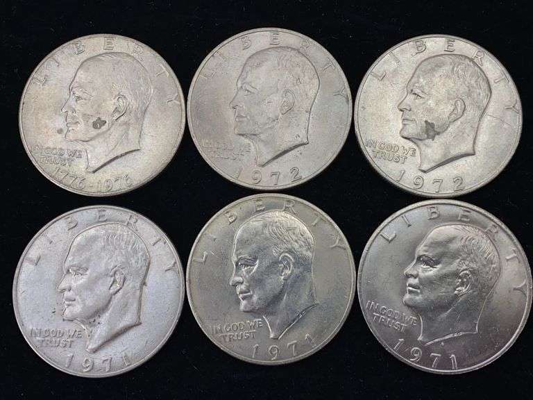 Six Eisenhower dollar coins: three 1971, two 1972, one 1976