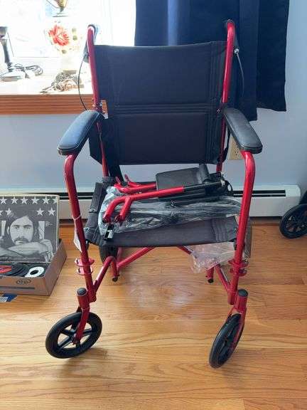 Expedition series red transport chair