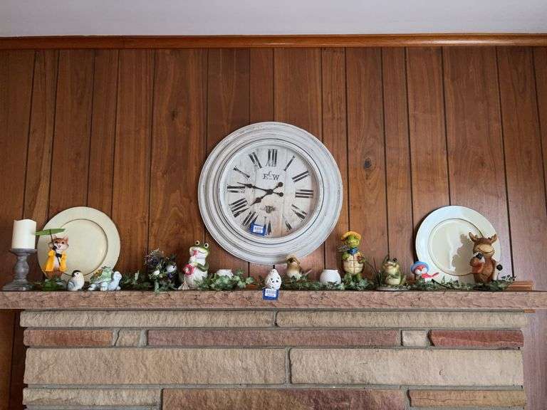 Contents of mantel: animal figurines, candle pedestal, plates - wall clock not included