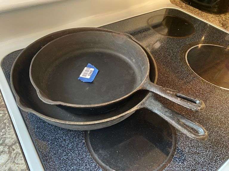 Two cast iron skillets