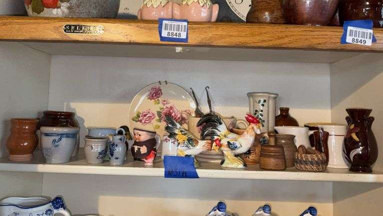 Contents of shelf: stoneware miniatures, chicken salt/pepper shakers, button hooks, misc pottery