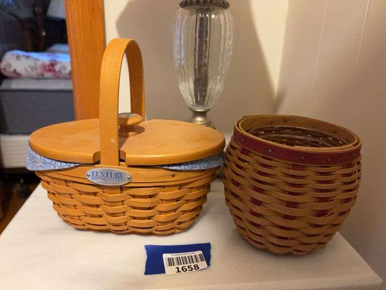 Two Longaberger baskets, one has wooden lid