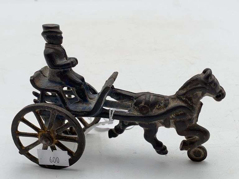 Horse drawn cast iron carriage w/ driver