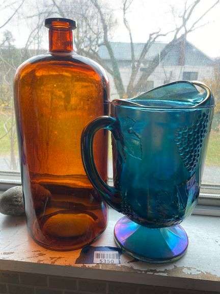 Amber apothecary bottle, and Indiana grape carnival glass pitcher