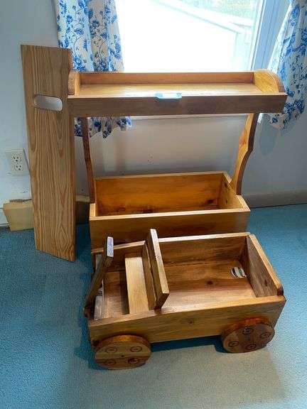 Two handcrafted wooden toy wagons