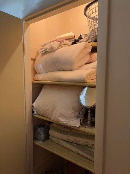 Contents of Hall Linen Closet, mirror, tissues, laundry basket, Overdoor Traction Set and more.