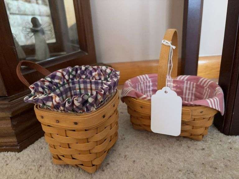 Two Longaberger baskets w/ fabric liners
