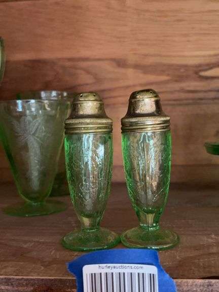 Pair of green depression glass salt/pepper shakers w/ metal tops