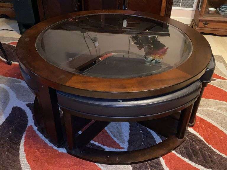 Round coffee table with stools