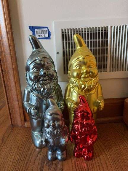 Four Gnome figures w/ metallic finish